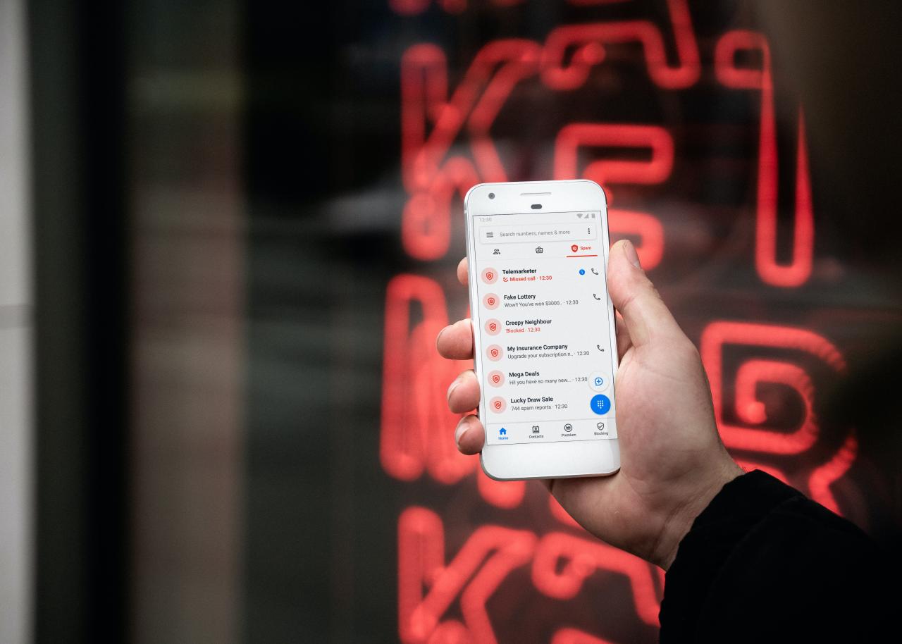 An image of a phone with a plethora of missed calls in the "Spam" folder.