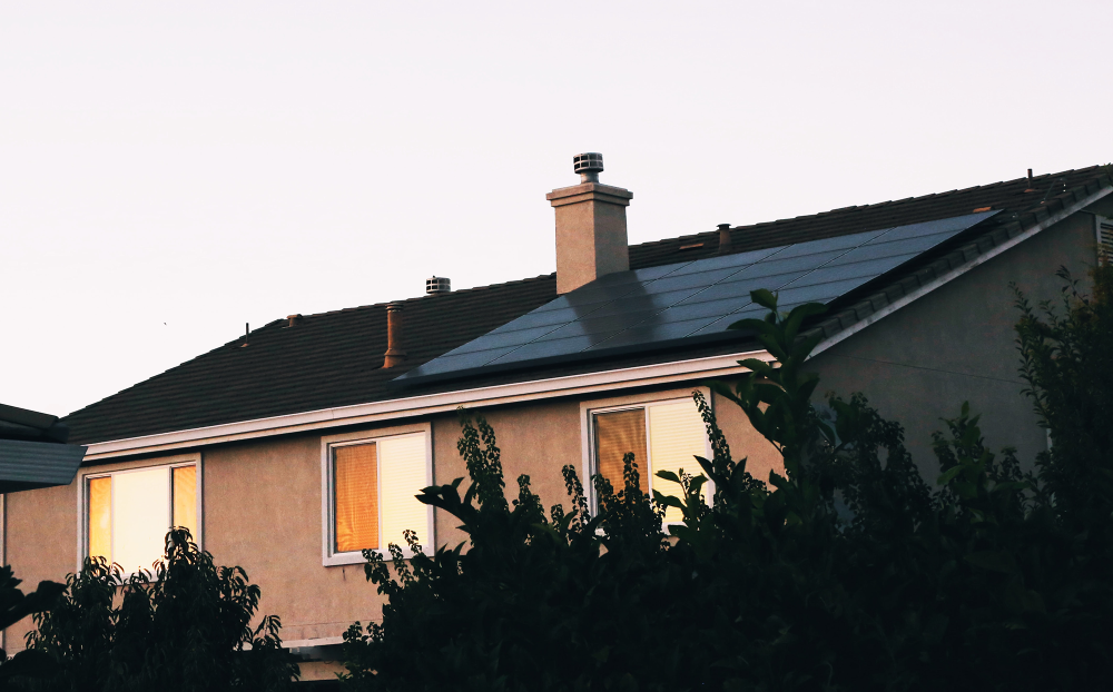 solar panels on house at dusk