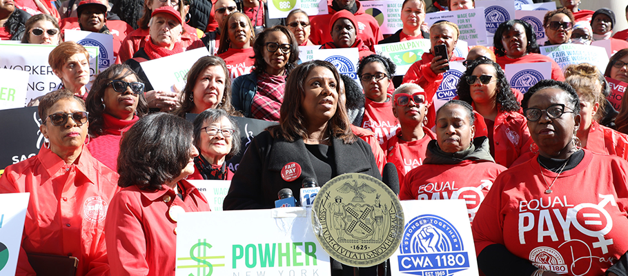 AG James in a with a crowd fighting for equal pay
