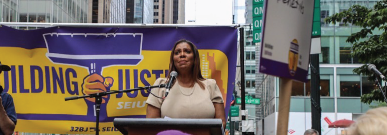 AG James speaking on defending workers