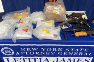 Table displaying guns and drugs