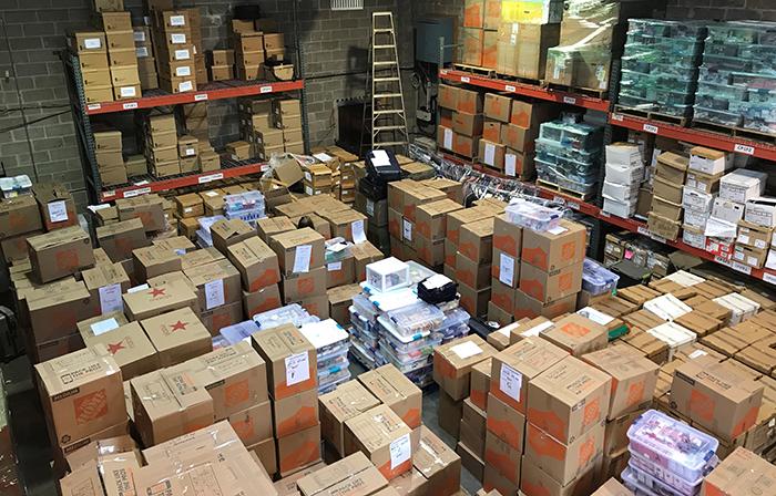 Boxes of stolen goods in warehouse storage
