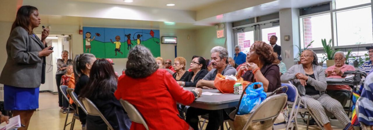 AG James speaking with seniors and retirees