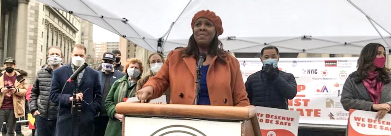 Ag James behind podium