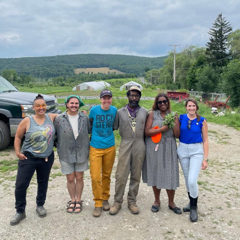 AG James with farmers