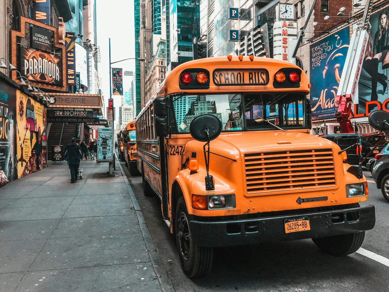 school bus parked on a city street