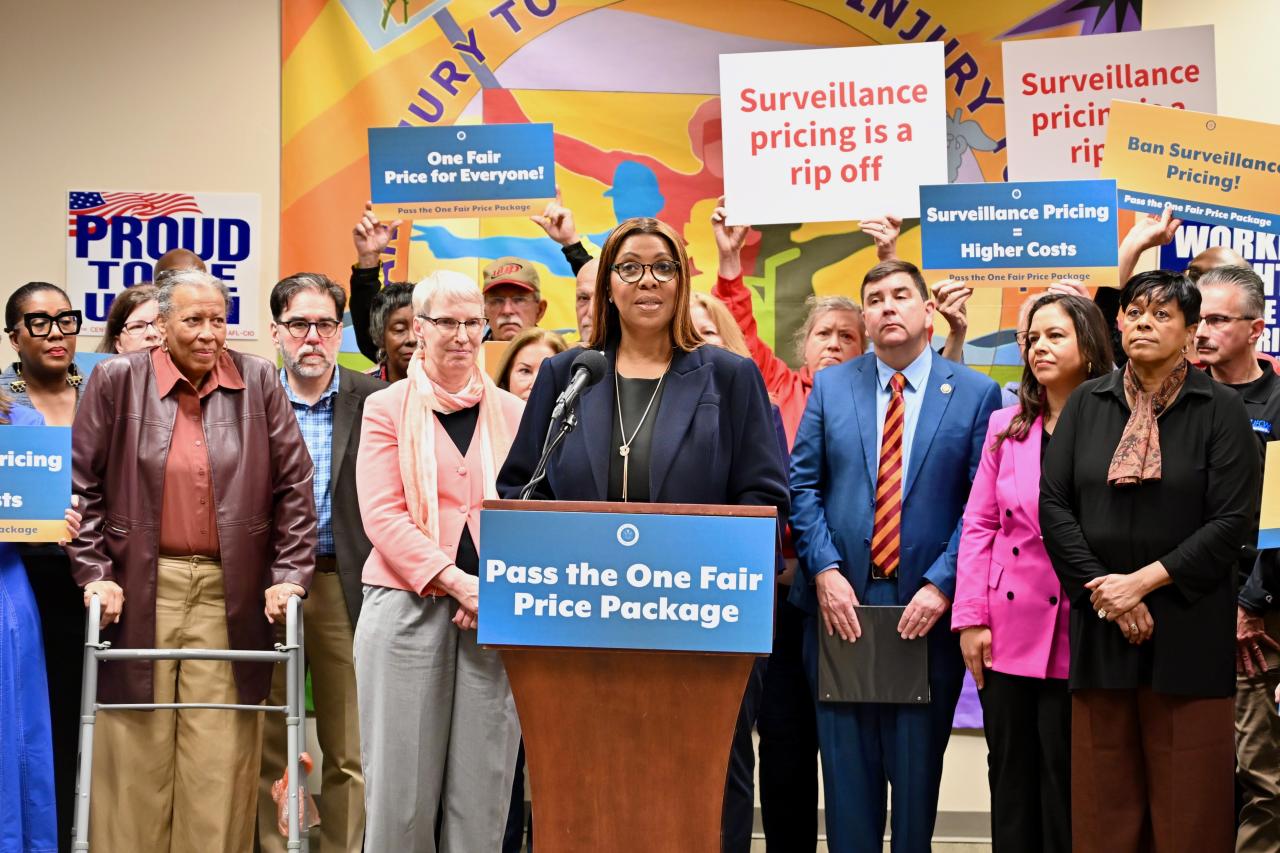AG James stands at podium at One Fair Price Package rally