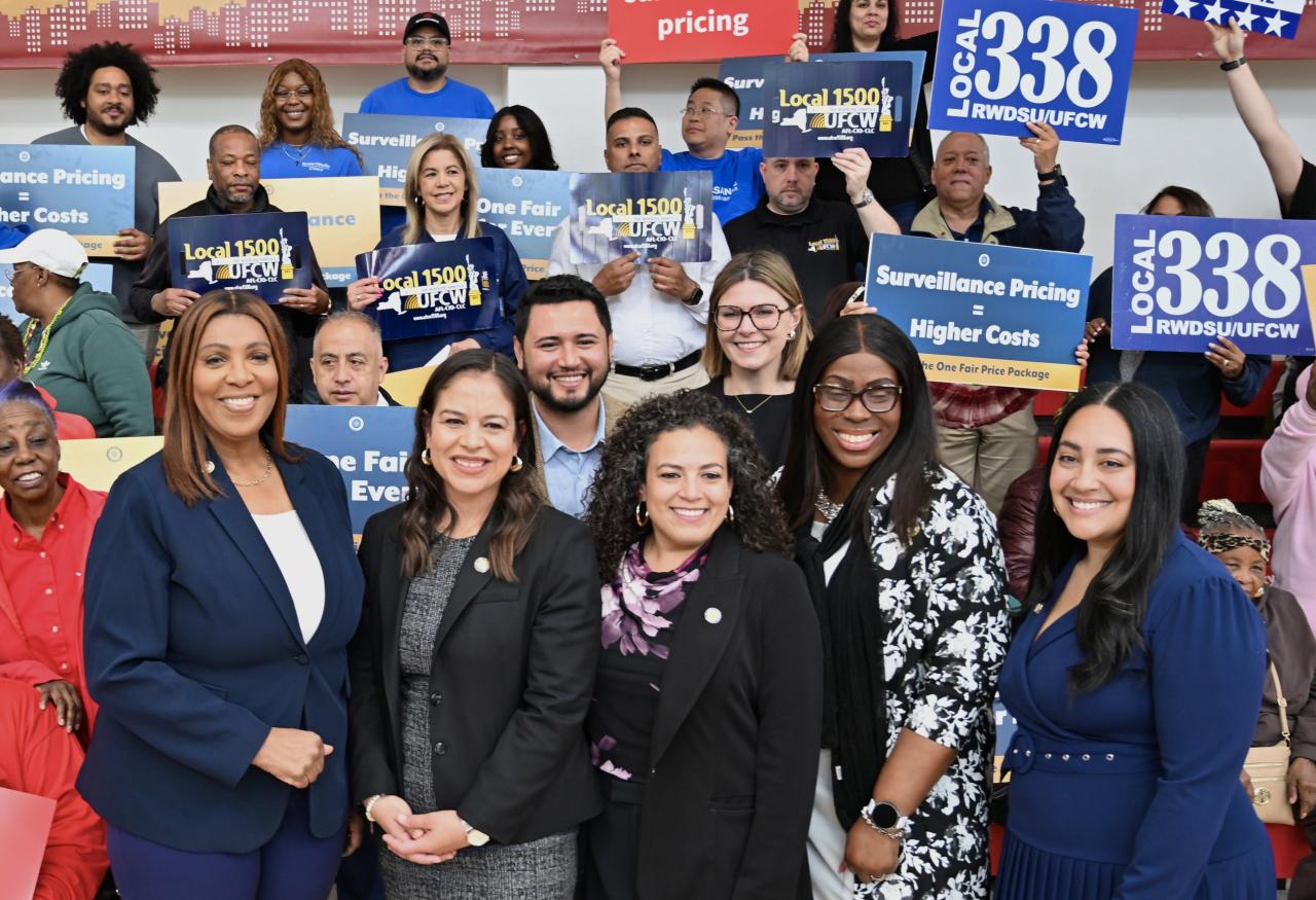 AG James with a group of people rallying for the One Fair Price Package